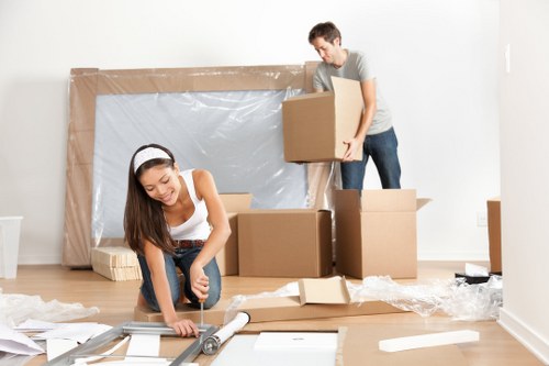 Office relocation planning in Muswellhill with packed boxes and workstations
