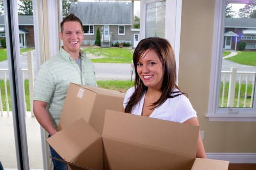 Professional movers handling furniture during a Muswell Hill relocation