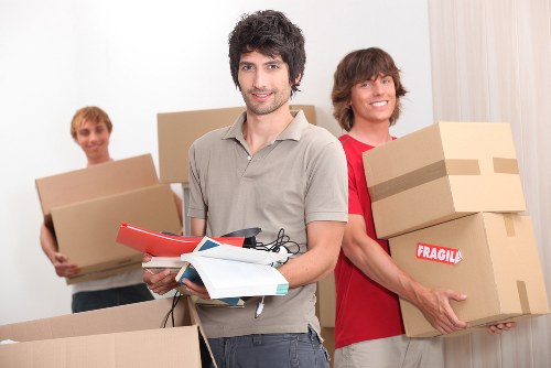 Moving boxes and furniture prepared for house removals in Muswellhill