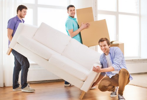 Professional removals service in Muswellhill with moving boxes and packed furniture